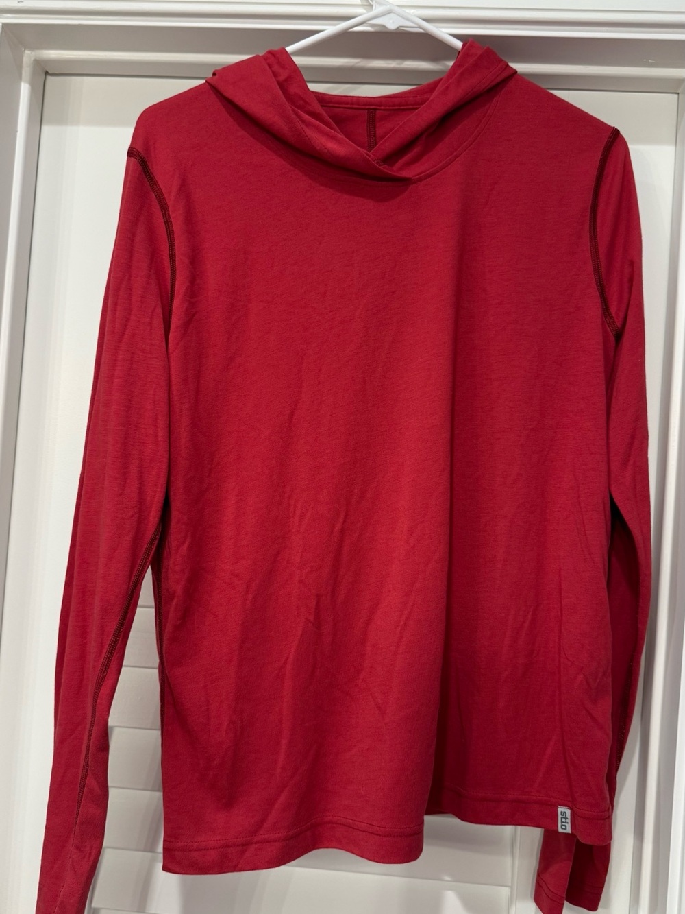 Stio lightweight hoodie size M in a deep pink / coral / light red color